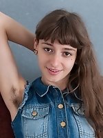 Young WIllow shows off hairy pits and hairy pussy
